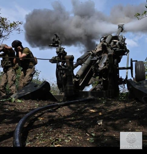 Ukrainian soldiers operate artillery positions near the front line as fighting continues across eastern Ukraine.