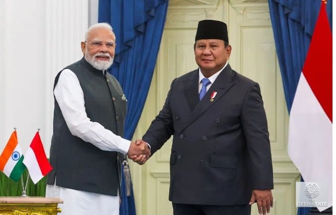 Prime Minister Narendra Modi and Indonesian President Prabowo Subianto shake hands during bilateral talks at the Presidential Palace in Jakarta.